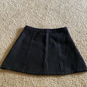 Lulu’s black mini skirt